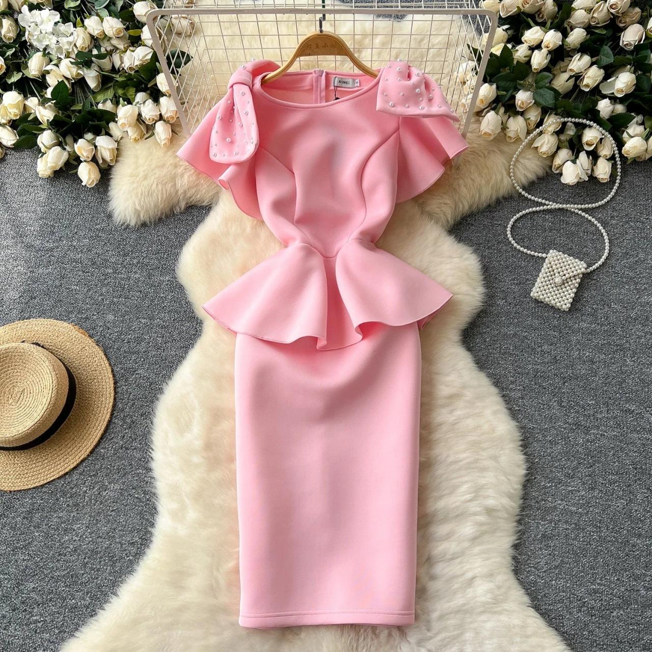Casual Couture Ruffled Peplum Pink Dress with Bow Detail